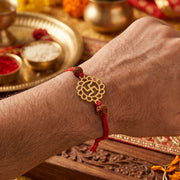 PNG Jewellers Elegant Swastik Gold Plated Rakhi for Men