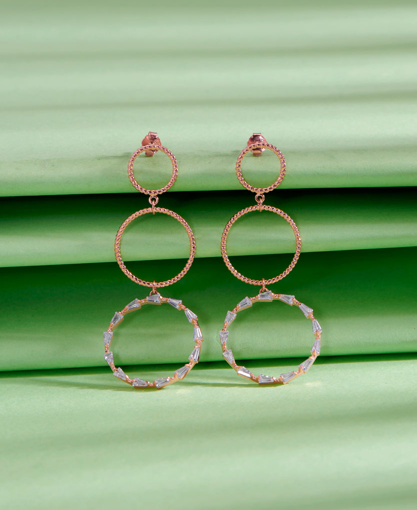 Synchronized Circlets Push Button Silver Earring